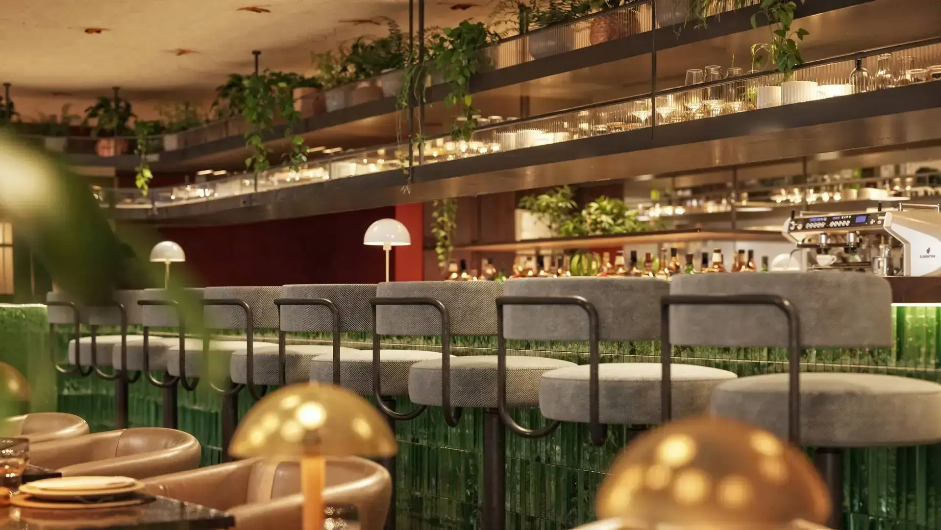 Stylish bar with lush greenery decor.