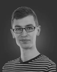 account management Person in striped shirt, neutral background.