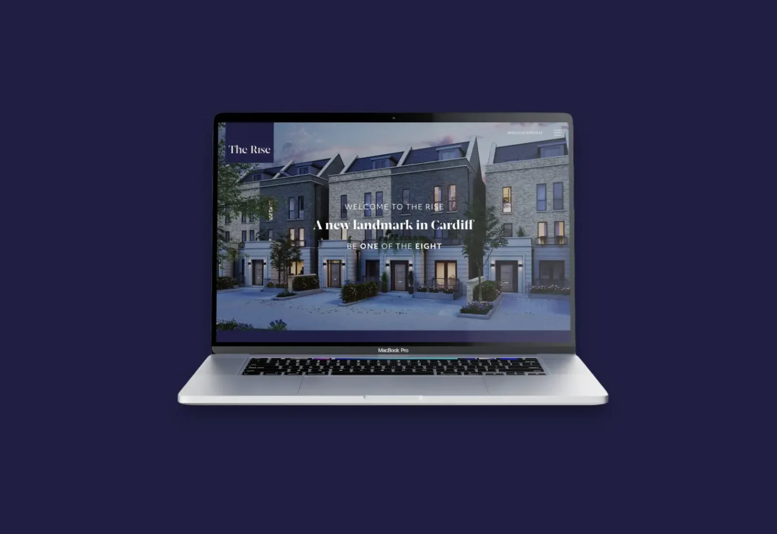 Laptop displaying a real estate website